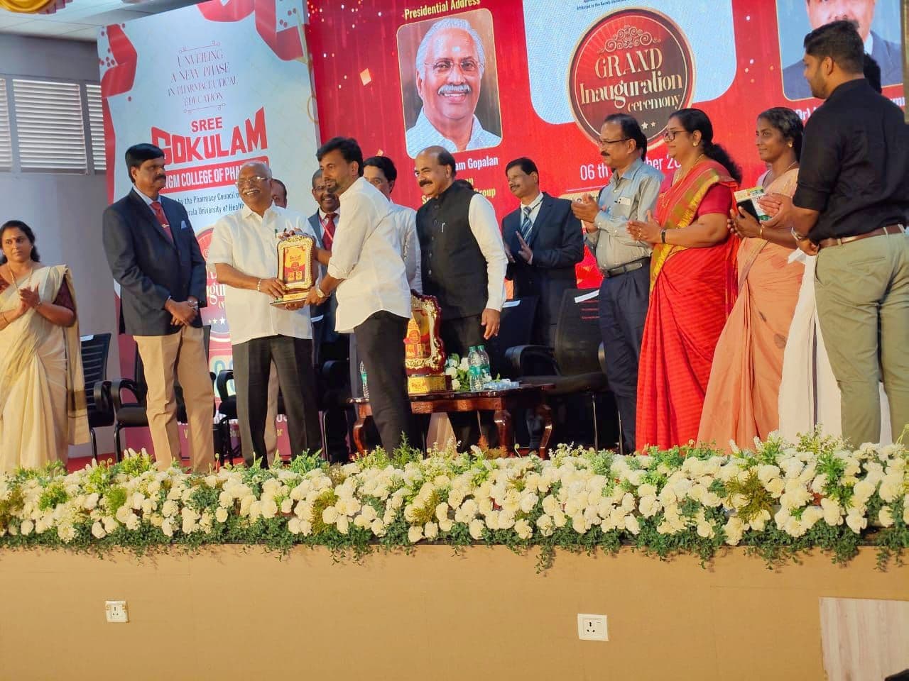 Felicitation on stage at a grand inauguration